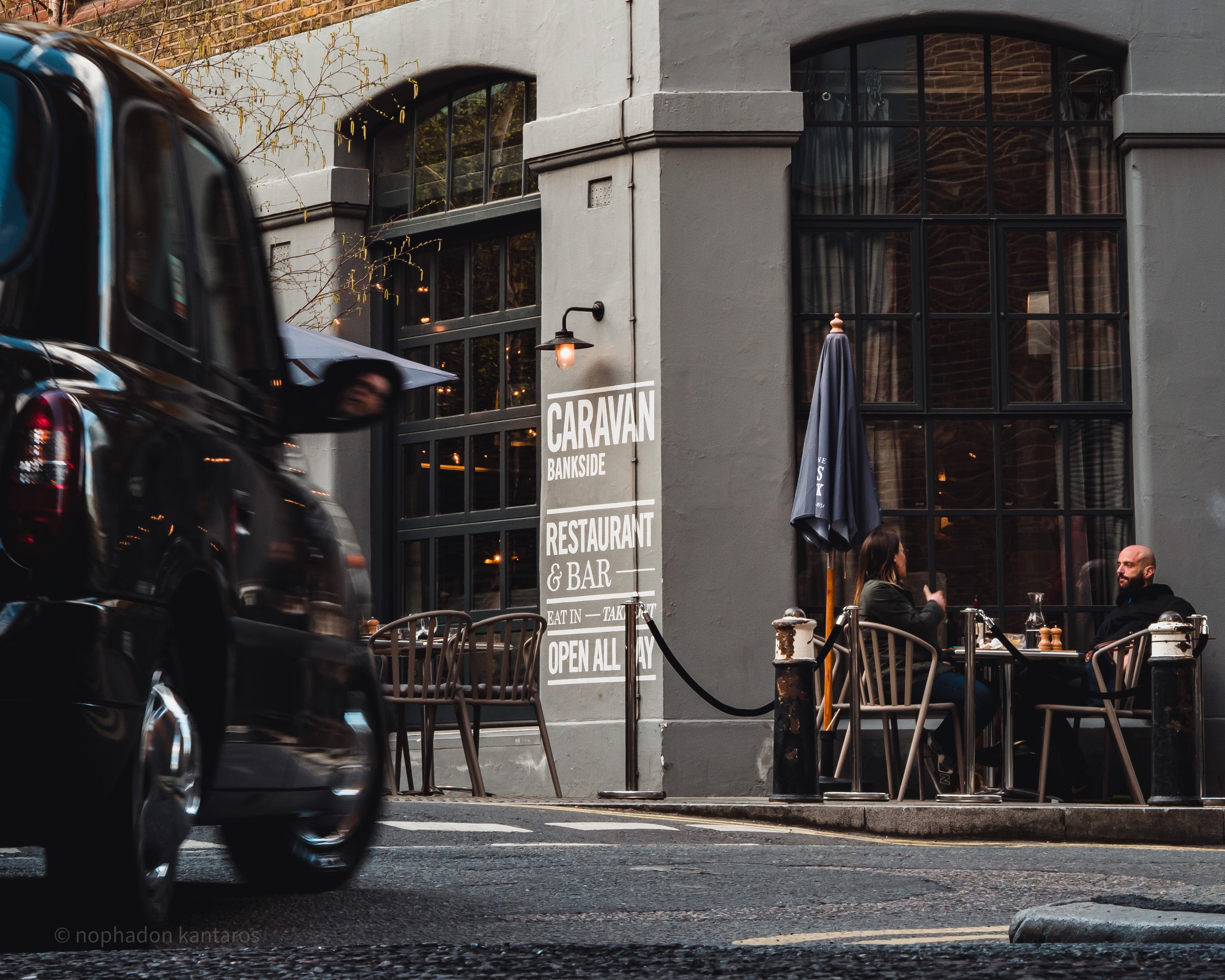 London taxi outside Caravan London Bridge restaurant