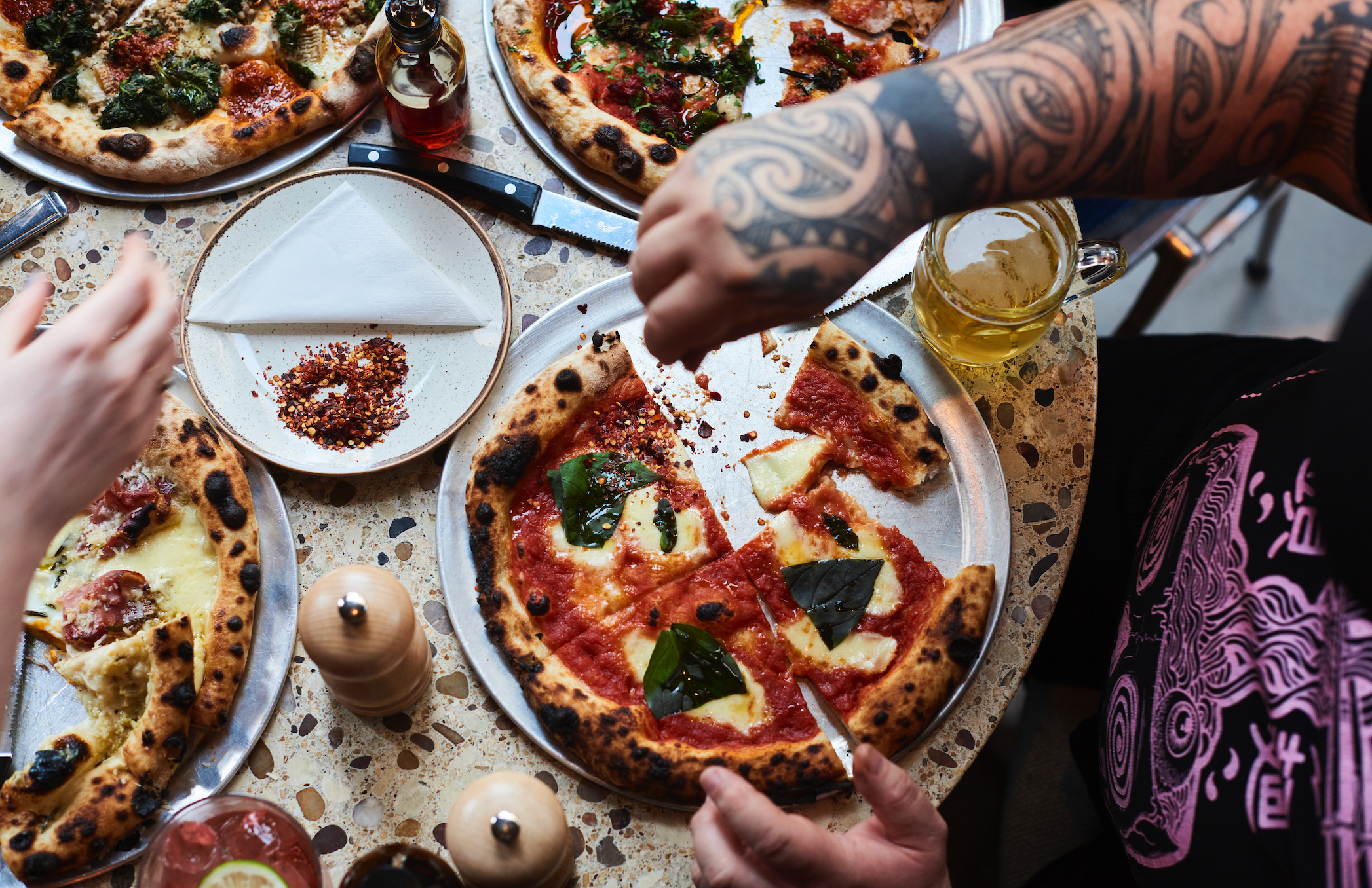 Pizza and beer at Caravan Canary Wharf