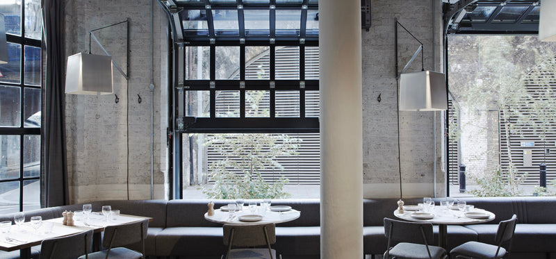 Caravan London Bridge restaurant dining roomwith open windows