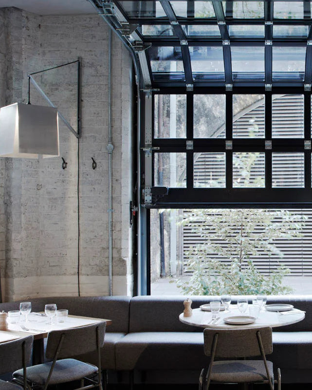 Interior scene of Caravan London Bridge with retractable windows